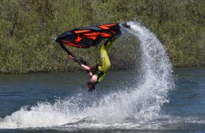 Photos by Clayton Franke / The Daily World
Freestyle jet-skier Tanner Thomas performs a backflip on Vance Creek Pond in Elma on Saturday, April 29, during the halftime show of the PNW Water X racing event.