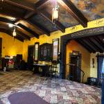 Matthew N. Wells / The Daily World
Ray Kahler, 7th Street Association board president, takes The Daily World on a short tour Tuesday afternoon of 7th Street Theatre. The gold paint throughout the lobby shows a little bit of the quality of work EverGreene Architectural Arts, out of New York, has done in the past when its been tasked with working on 7th Street Theatre. The company, which specializes in restoring theaters, churches and a few state capitols, was on day two of a lengthy project to repaint the J Street exterior side of the building, plus other work to the outside.