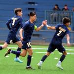 RYAN SPARKS | THE DAILY WORLD Aberdeens Edwin Quintana (10) is congratulated by teammate Hugo Garcia (2) after scoring a goal in the Bobcats 2-0 win over Hudsons Bay in a 2A Evergreen District 4 Tournament game on Saturday in Aberdeen.