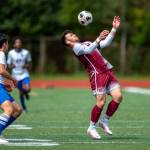 PHOTO BY FOREST WORGUM Montesanos Mateo Sanchez, right, plays the ball during the Bulldogs 7-2 victory in the 1A District 4 Tournament on Saturday in Montesano.