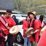Matthew N. Wells / The Daily World
Right before the start of the Missing Murdered Indigenous Woman walk on Friday, Omar Ivan Estrada, second from left, Tyson Reece, center with drum and Anthony Watkins, helped lead the walk in a Mourning Prayer song. In addition to the three students mentioned, they couldnt have done it without their female classmates, who Reece called warriors.
