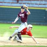 RYAN SPARKS / THE DAILY WORLD 
Montesano shortstop Bode Poler tags out Castle Rocks Jerry Neighbors after an attempted steal during the Bulldogs 7-4 win in a 1A District 4 Tournament game on Monday at Olympic Stadium in Hoquiam.