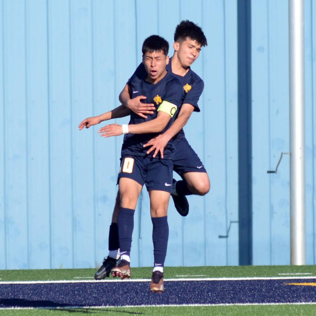 RYAN SPARKS | THE DAILY WORLD Aberdeens Edwin Quintana (10) and Juan Serrano embrace after Serrano scored a goal in the first half of the Bobcats 1-0 win over Tumwater in a 2A District 4 semifinal game on Tuesday in Aberdeen.