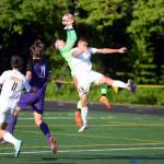 RYAN SPARKS | THE DAILY WORLD Aberdeens Carlos Hernandez leaps in an attempt to head the ball against Columbia River goal keeper Cameron Harris during the Bobcats 3-0 loss in the 2A District 4 championship game on Thursday at Columbia River High School in Vancouver.
