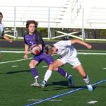 RYAN SPARKS | THE DAILY WORLD Aberdeens Colby Mendoza, right, heads the ball against Columbia Rivers Ryland Perron during the Bobcats 3-0 loss in the 2A District 4 championship game on Thursday at Columbia River High School in Vancouver.