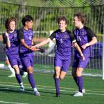 RYAN SPARKS | THE DAILY WORLD Columbia Rivers Alexander Harris (9) is congratulated by teammates after scoring his second goal of the game early in the first half against Aberdeen in the 2A District 4 championship game on Thursday in Vancouver.