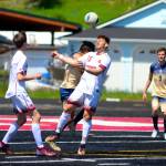RYAN SPARKS | THE DAILY WORLD Montesano senior midfielder Mateo Sanchez (15) heads the ball during the 1A District 4 Championship game on Saturday in Tenino.