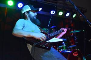 Matthew N. Wells / The Daily World
Jamie Attwood, bassist for Ms. Maki & Co, rocks out during the bands set at Celebrate Summer Jam on Saturday at Ocean Shores Convention Center. The band was one of 10  including Leah Justine, a country music star, to play on the hottest day of the year so far.