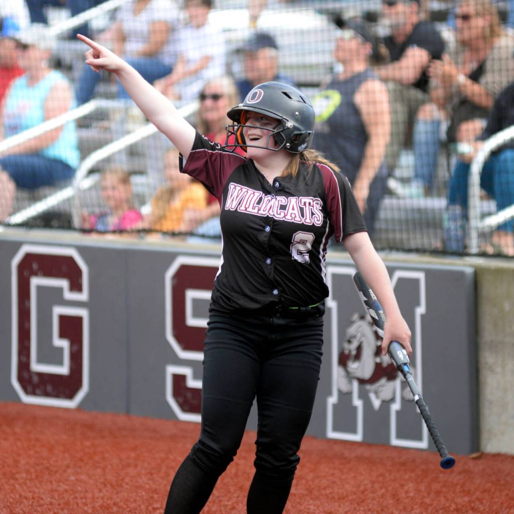 RYAN SPARKS | THE DAILY WORLD Ocostas Brynn Rasmus points to teammate Zaida Morales after scoring the games only run in a 1-0 victory over Onalaska in a 2B District 4 Tournament game on Monday in Montesano.