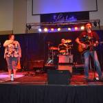 From left, Steve Leggett, Angel Phoenix Damasiewicz, Christian Svinth, Wil Russoul, and Tiffany Maki, played for an approximate 20-minute set to a lively crowd at Celebrate Summer Jam on Saturday, at Ocean Shores Convention Center. The collective — The Akoostiks — was one of 10 music acts to perform for more than a couple hundred people. (Matthew N. Wells / The Daily World)