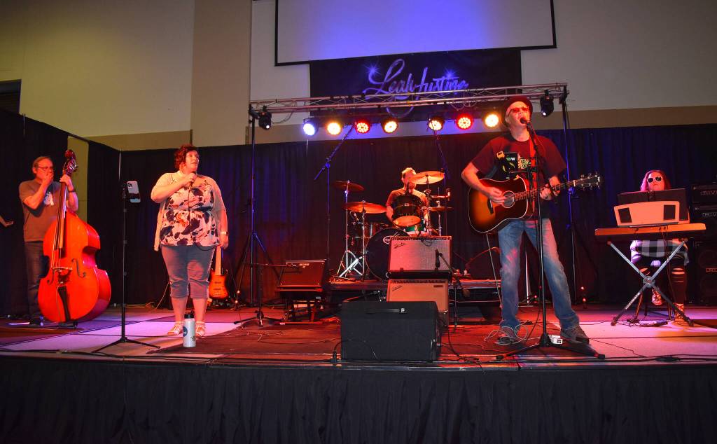 From left, Steve Leggett, Angel Phoenix Damasiewicz, Christian Svinth, Wil Russoul, and Tiffany Maki, played for an approximate 20-minute set to a lively crowd at Celebrate Summer Jam on Saturday, at Ocean Shores Convention Center. The collective — The Akoostiks — was one of 10 music acts to perform for more than a couple hundred people. (Matthew N. Wells / The Daily World)