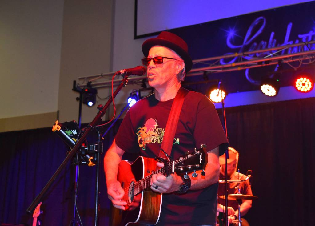 Matthew N. Wells / The Daily World
Despite playing on a guitar he wasnt familiar with, Wil Russoul, who plays guitar and vocals for The Akoostiks, gave a soulful performance along with his bandmates. He said the adjustments the band had to make for Saturdays live performance was just part of show business.