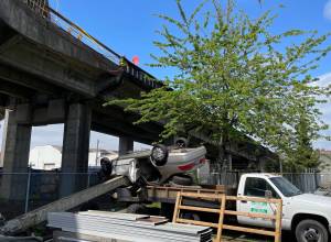 Michael S. Lockett / The Daily World
A wrong-way driver landed in a construction companys property after swerving off the Chehalis River Bridge on Friday, May 12.