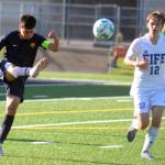 RYAN SPARKS / THE DAILY WORLD 
Aberdeen midfielder Edwin Quintana clears the ball forward against Fifes Simon Berry during the Bobcats 1-0 win in a 2A State playoff game on Tuesday in Aberdeen.