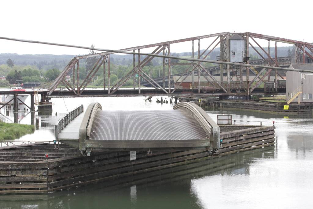 Michael S. Lockett / The Daily World
Washington State Department of Transportation personnel open the Heron Street Bridge during a maintenance inspection on May 16.