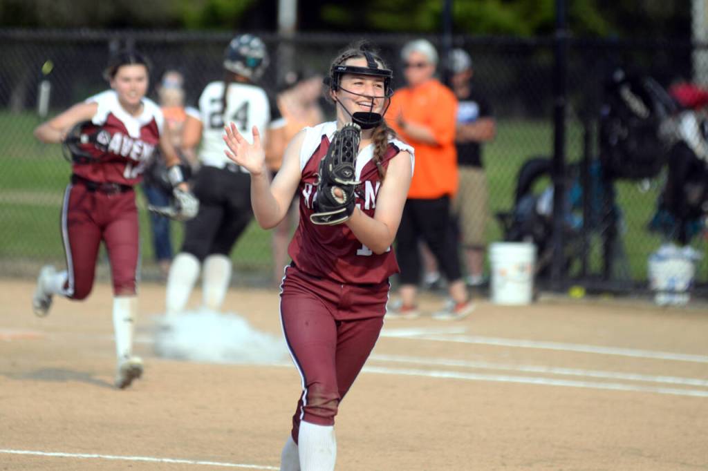 RYAN SPARKS / THE DAILY WORLD Raymond-South Bend pitcher Ashlee Payne cheers after the final out of the Ravens 7-2 win over Rainier in the 2B District 4 Tournament on Wednesday in Centralia.
