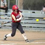 RYAN SPARKS / THE DAILY WORLD Hoquiam catcher Faith Prosch drills a pitch during the Grizzlies 24-3 victory over Hoquiam in the 1A District 4 semifinals on Wednesday at Fort Borst Park in Centralia. Prosch had two home runs in the game.