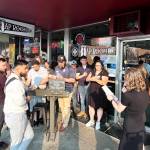 A group of members of Grays Harbor Young Professionals listen as their founders thank them for all they do, announce the raffle prizes, and the groups Star of the Quarter. The group started from Desiree Lindgren, far right, and Sydney Renae, right. Now, GHYP has about 60 members. (Matthew N. Wells / The Daily World)