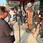 Matthew N. Wells / The Daily World
Rick Moyer films Stuart Ball, one of the first members of Grays Harbor Young Professionals, as he interviews Desiree Lindgren, GHYPs founder, about the groups success. GHYP not only helps younger people network with other young people, which is what attracted Ball to the group, but the group also coordinates community cleanups and volunteers in other ways throughout Grays Harbor County.