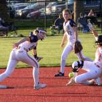RYAN SPARKS | THE DAILY WORLD A throw to second gets past Aberdeen shortstop Zoe Vessey, left, and Aili Scott as Centralias Lauren Wasson slides in safely during the Bobcats 7-2 loss in a 2A District 4 semifinal game on Thursday in Chehalis.