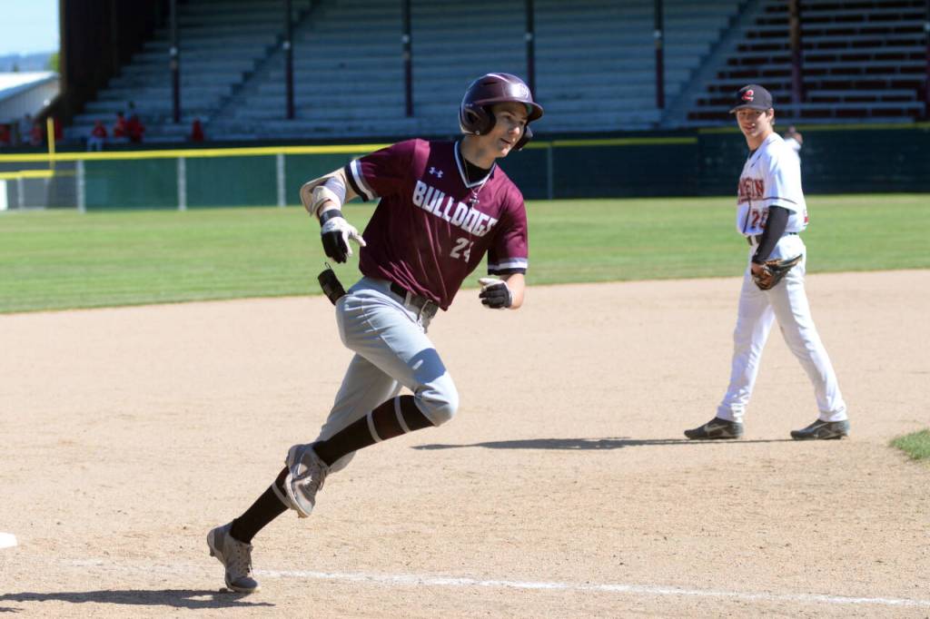 RYAN SPARKS | THE DAILY WORLD Montesanos Bode Poler rounds third after hitting a leadoff home run in the first inning of the Bulldogs 5-4 victory over Colville in a 1A State quarterfinal game on Saturday at Olympic Stadium in Hoquiam.