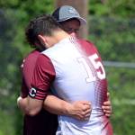 RYAN SPARKS | THE DAILY WORLD Montesano senior co-captain Mateo Sanchez hugs his father and Montesano head coach Fidel Sanchez after a 2-0 loss to Seton Catholic in the 1A State quarterfinal round on Saturday in Montesano.
