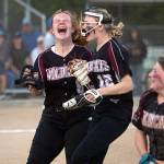 Ocosta's Jessie Gilbert yells in celebration after helping the Wildcats win the 2B District 4 championship over Adna May 20 at Borst Park in Centralia.