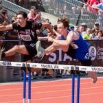 JARED WENZELBURGER | THE CHRONICLE Raymonds Morgan Anderson, left, races against La Conners Tommy Murdock in the boys 110-meter hurdles at the 2B State Championships Saturday in Yakima.