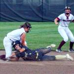 PHOTO BY SHAWN DONNELLY 
Montesano senior second baseman Jordan Karr, left, puts the tag on Royals Lily DelaRosa during the Bulldogs 8-2 win over Royal in the 1A State Softball Championship game on Sunday in Richland.