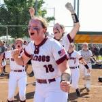 PHOTO BY SHAWN DONNELLY Montesanos Kylee Wisdom (18), Carsyn Wintrip (left) and Allison Mills (background) celebrate winning the 1A State Softball Championship after an 8-2 victory over Royal on Sunday in Richland.
