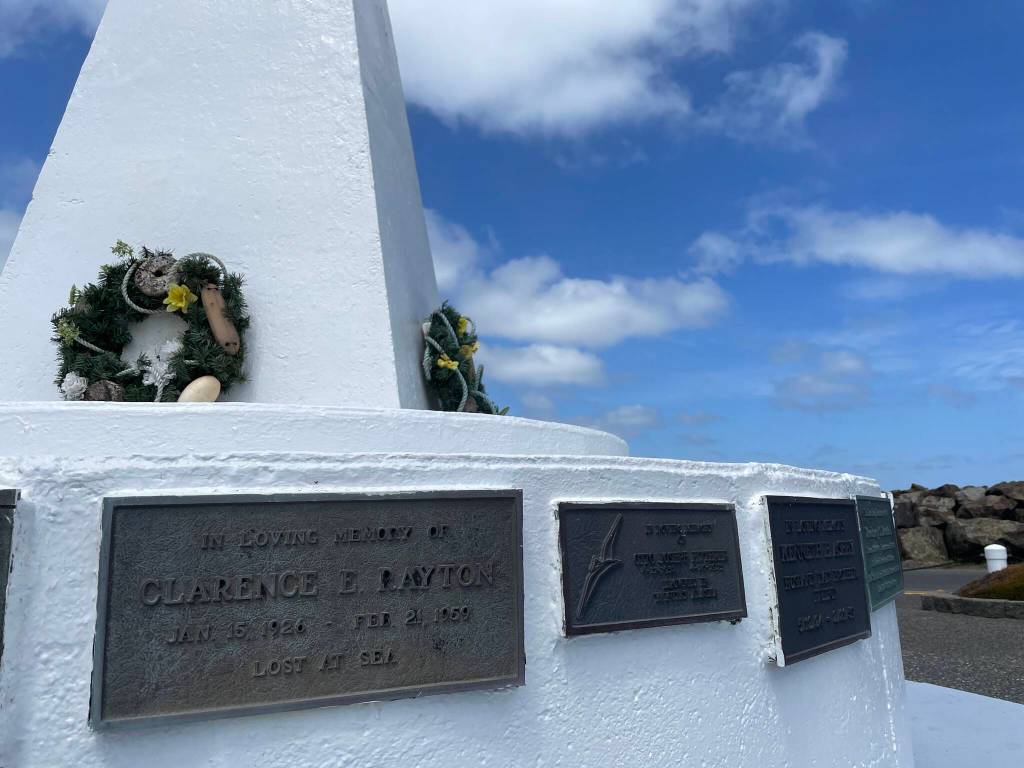Dozens gathered at the Westport Fishermans Monument on May 28 to honor those claimed by the sea. (Michael S. Lockett / The Daily World)