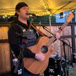 Matthew N. Wells / The Daily World
Clinton Dogger Mullins, who has grown up on the Harbor, plays and sings the guitar during an approximate three-hour set full of originals and cover songs on Friday night at Red Cedar at the Vasa. One of the highlights of the night was when he sung Hellbound Glorys song Streets of Aberdeen.