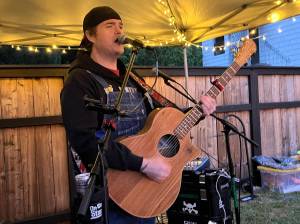 Matthew N. Wells / The Daily World
Clinton Dogger Mullins, who has grown up on the Harbor, plays and sings the guitar during an approximate three-hour set full of originals and cover songs on Friday night at Red Cedar at the Vasa. One of the highlights of the night was when he sung Hellbound Glorys song Streets of Aberdeen.