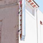 Matthew N. Wells / The Daily World
On the left is a corner of the front facade on 7th Street Theatre that needs work. On the right is part of the Renwick Beige-colored wall that is on the J Street side of the building. $175,000 is still needed to pay to restore the front facade. The front facade will be painted the same color.