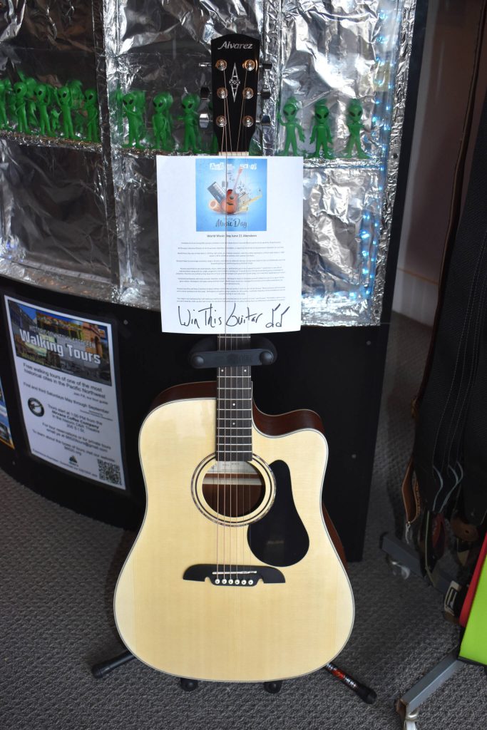 Matthew N. Wells / The Daily World
A guitar is the main prize for a free raffle on Wednesday, June 21, to help celebrate World Music Day. This is the first time World Music Day will be celebrated in downtown Aberdeen. The celebration will start at 11:30 a.m., in front of The Green Room, near the intersection of West Wishkah and South K streets.