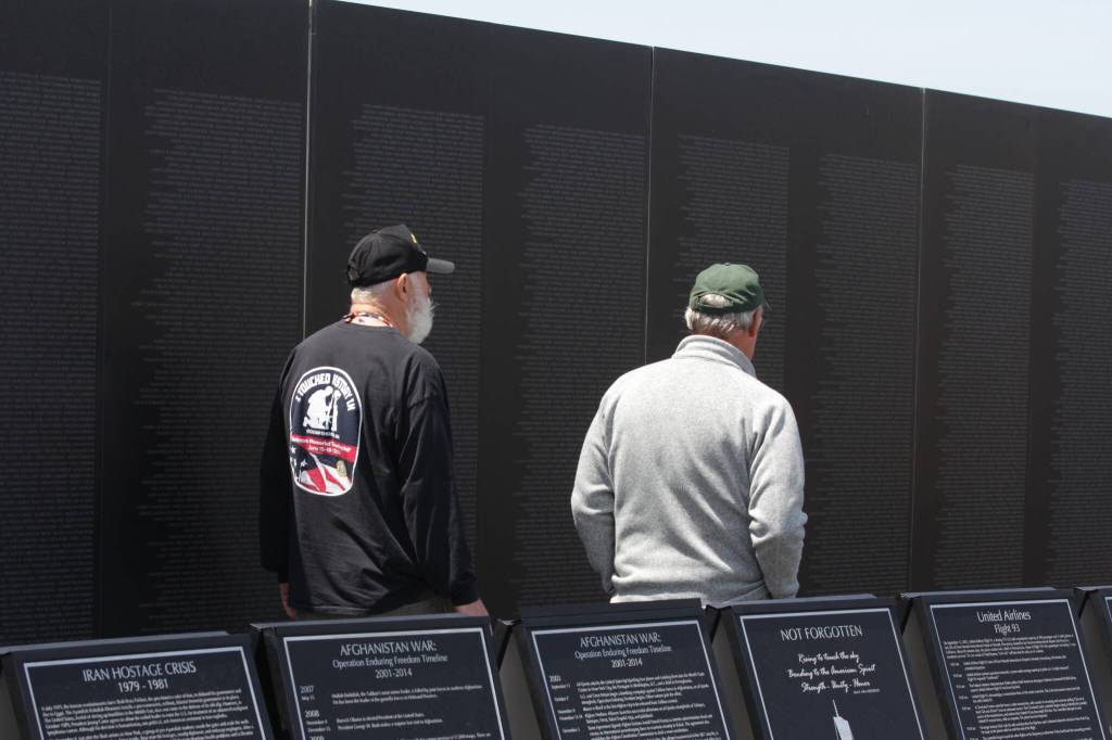 More than 58,000 names from the Vietnam War, and thousands more from subsequent wars, are inscribed in the wall of a traveling replica of the Vietnam Veterans Memorial hosted for a weekend in June at the Quinault Beach Resort and Casino. (Michael S. Lockett / The Daily World)