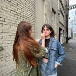 Matthew N. Wells / The Daily World
Cassie Palmisano, left, gives Mia Moore Marchant a makeup touch-up on Tuesday afternoon, which was also the films first day of shooting. Marchant not only is responsible for the lead role Aggie, shes also the films screenwriter, producer and co-director of Again Again. The crew on Tuesday was staging at the edge of the alley on South I Street, near The Aberdeen World building.