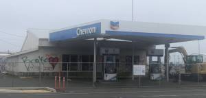 Michael Wagar / The Daily World
The Hungry Whale Grocery store and gas station sit on the west corner of North Montesano Street and Wilson Avenue in Westport, property owned by the Port of Grays Harbor. Excavators have begun to dig test holes into soil that was contaminated by a gasoline leak 40 years ago, and will soon demolish the gas station and excavate the site.