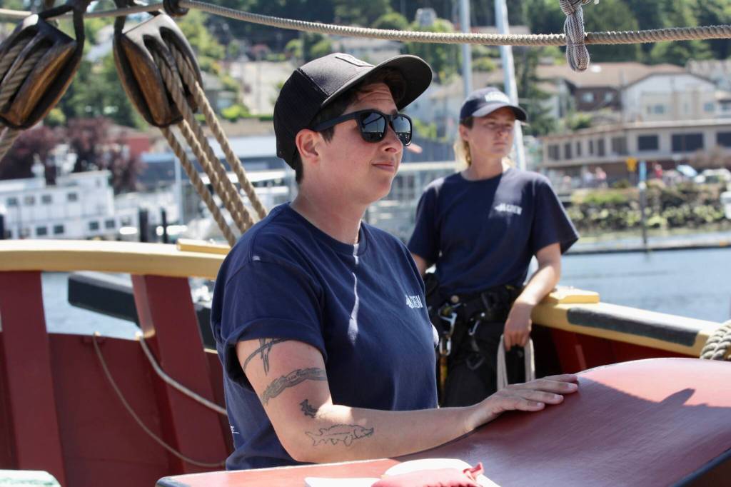 Michael S. Lockett / The Daily World
Capt. Katherine Pogue of the Lady Washington steers the ship into Port Orchard on July 2.