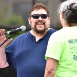 Matthew N. Wells / The Daily World
Phil Luceman, emcee for the 10th anniversary of Aberdeen Founders Day Parade, shares a laugh with Karen Rowe. Rowe, with her husband Ryan and Tawni Andrews, takes point in getting the parade going, as they do every year in July.
