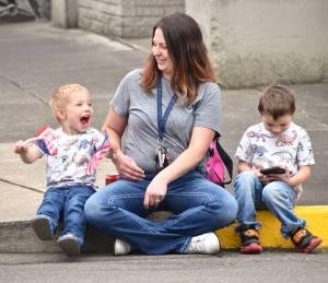 Matthew N. Wells / The Daily World
Christina Jones, center, looks at her three-year-old son Liam as they and her four-year-old son Sebastian, right, await the start of the Aberdeen Founders Day Parade. In its 10th year, the festival, which includes a parade down Market Street, countless vendors  food and merchandise  an Aberdeen Walk of Stars dedication and other activities, seemed to delight everyone.
