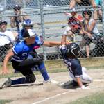 RYAN SPARKS | THE DAILY WORLD Elma pitcher Brysten Crawford, left records an out against Bellevue Nationals Ben Haufe during a 6-3 victory on Saturday in Elma.
