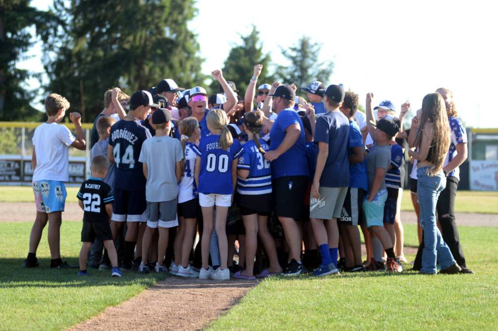 RYAN SPARKS | THE DAILY WORLD The Elma Intermediate all-star team is joined by past and present Elma Little Leaguers for a cheer at the conclusion of a send-off parade and ceremony for the team ahead of its departure to compete in the Little League West Regional in Nogales, Arizona. Representing Washington, Elma will face Oregon at 5 p.m. on Friday.