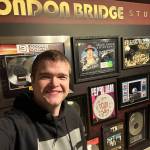 Provided photo
Clinton Dogger Mullins stands in front of a wall full of records at London Bridge Studio in Seattle. Dogger will a release a new album Atta Bomb on Saturday. Dogger, with the help of Producer Jonathan Plum, recorded and mastered the album there.