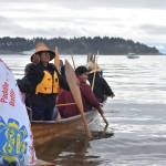 Ann Penn-Charles, a Quileute cultural leader and canoe skipper, asks for permission from the Makah tribe to leave Neah Bay Saturday morning, July 22. (Clayton Franke / The Daily World)