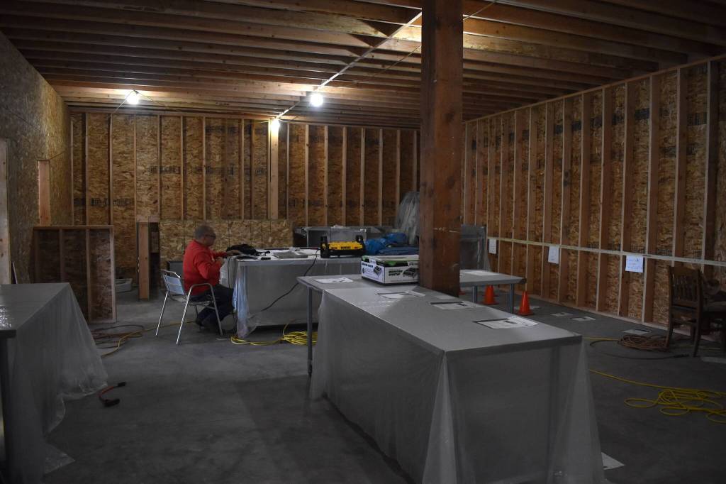 A view of a future kitchen inside the historic La Vogue building. The kitchen already has a few amenities, such as a triple sink, refrigerators, dishwasher, multiple ovens and sandwich bars for paninis, plus additional storage. The Jitter House, which is next door to this construction space, is well-known for its smooth coffee and delicious pastries and hearty meals. (Matthew N. Wells / The Daily World)