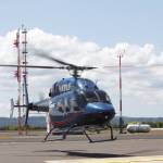 A Life Flight Network medevac helicopter takes off after a call to transport a patient interrupted a grand opening ceremony for the organization at Bowerman Airport on July 26. (Michael S. Lockett / The Daily World)