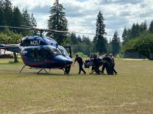 Grays Harbor Fire District 10 and Aberdeen Fire Department personnel responded to a motorcycle crash involving multiple victims on Saturday afternoon, requiring one to be medevaced for critical injuries by Life Flight Network. (Courtesy photo / The Daily World)