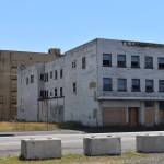 Matthew N. Wells / The Daily World
The former Hotel Morck, left, and the property at 209 W. Wishkah St. in Aberdeen show what drivers can see  boarded up windows, shattered windows, exposed boards and grime  as they head west down West Wishkah Street. Its also an example of part of the work the city is trying to do, which is to improve the city. Last week, Aberdeen City Administrator Ruth Clemens relayed to the city council the results of a thorough survey from this late winter and spring intended for residents and business owners to air their concerns about issues regarding the problems parts of the homeless population are creating for the city.