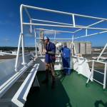 Michael S. Lockett / The Daily World
Port of Grays Harbor Capt. Ryan Leo and the captain of the SLNC Severn watch as the ship inches closer to the pier on July 27.